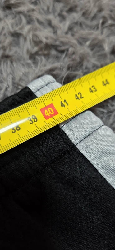 Nike Track Pants Negro con Franjas Blancas